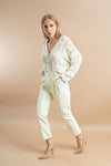 Warm white cardigan with full sleeves and button details for a timeless look