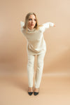 Cozy turtle neck knit white co-ord set, full sleeves and wide-leg trousers