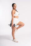 White high-waisted shorts and sports bra set for women’s fitness