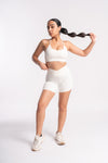 White seamless sports bra and high-waist shorts set for women