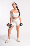 woman's gym set with sports bra and shorts of breathable fabric