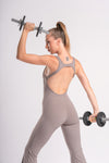 Flared jumpsuit for gym and yoga, featuring a backless design for comfort and flexibility