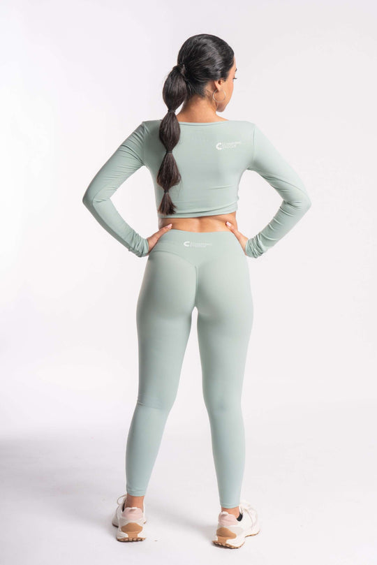 grey color performance leggings for woman with full sleeves cropped top